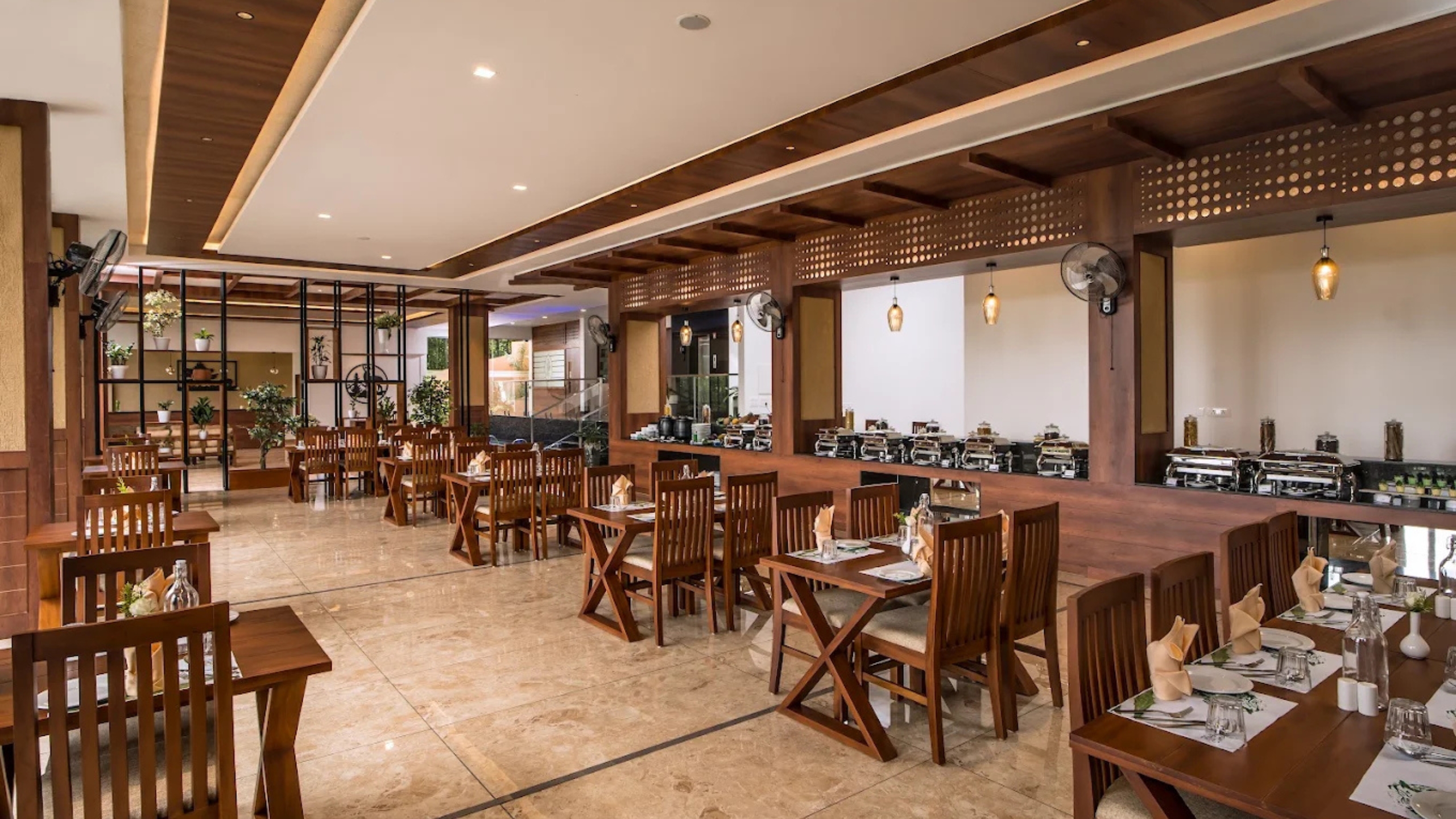 Bay Leaf Restaurant by Wild Avenue in Vandiperiyar offering multi-cuisine meals and outdoor dining near Thekkady