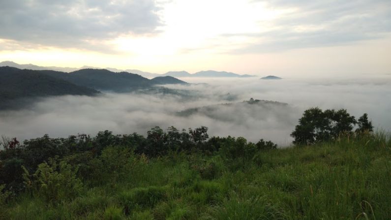 Street view of Omassery showcasing local life and popular restaurants in Omassery serving Kerala and Arabian cuisine
