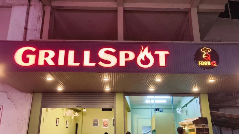 Front view of Grillspot, a modern grill restaurant among restaurants in omassery